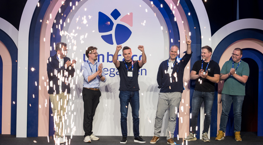 NXT team winning the "Best Innovation with AI" award